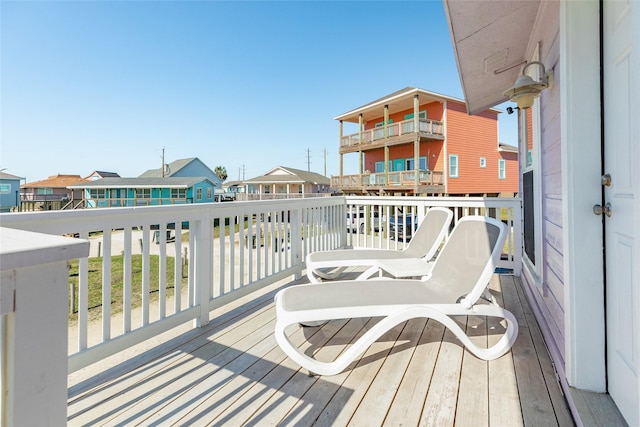 4406 Tampico Way, Galveston, TX 77554 - wooden deck with a residential view