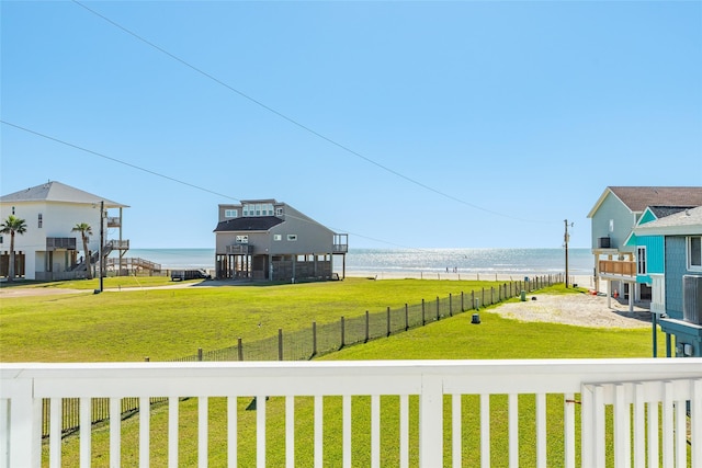 4406 Tampico Way, Galveston, TX 77554 - view of yard with a water view and fence