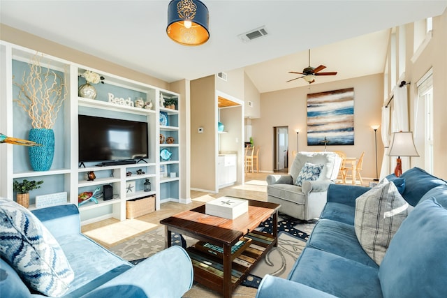 4406 Tampico Way, Galveston, TX 77554 - living room with lofted ceiling, visible vents, and a ceiling fan