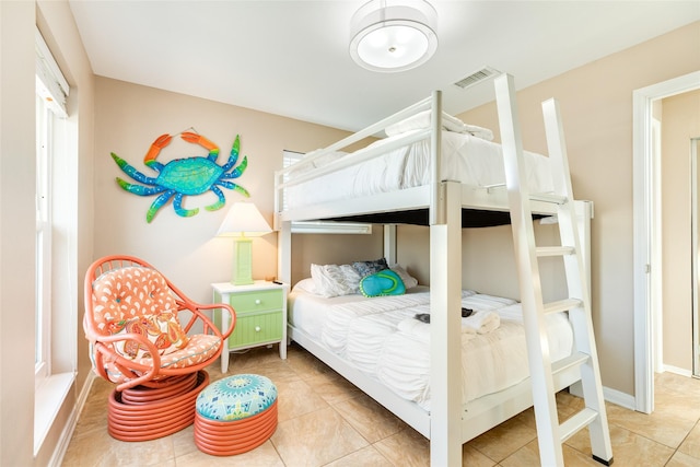 4406 Tampico Way, Galveston, TX 77554 - bedroom with tile patterned flooring, baseboards, and visible vents