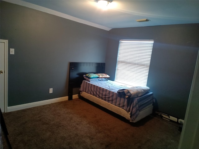 bedroom with baseboards, visible vents, and carpet floors