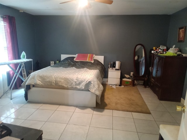 bedroom featuring ceiling fan and light tile patterned floors