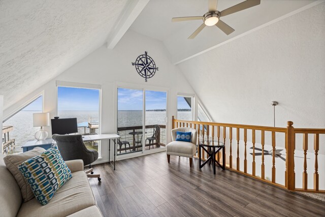 office space featuring ceiling fan, high vaulted ceiling, wood finished floors, a water view, and beamed ceiling