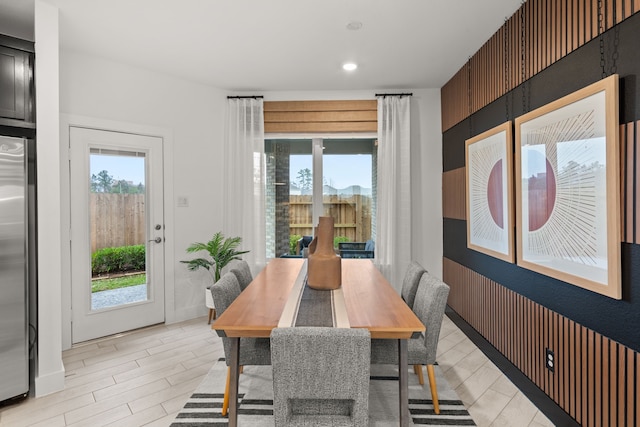 dining area with recessed lighting, light wood finished floors, and a wealth of natural light