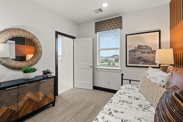 bedroom with carpet, visible vents, recessed lighting, and baseboards