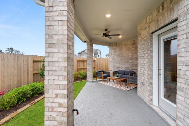 view of patio / terrace featuring outdoor lounge area, ceiling fan, and a fenced backyard