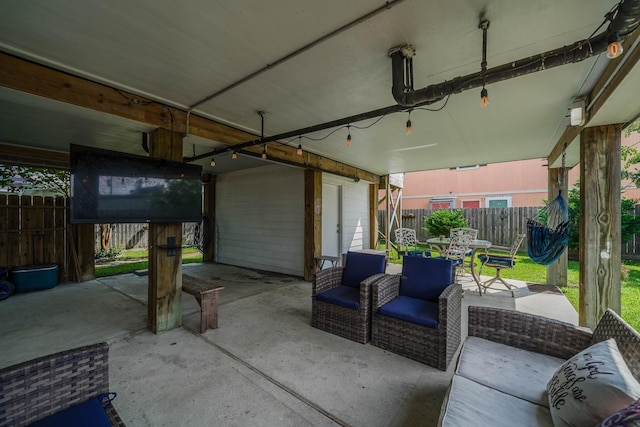 garage with fence