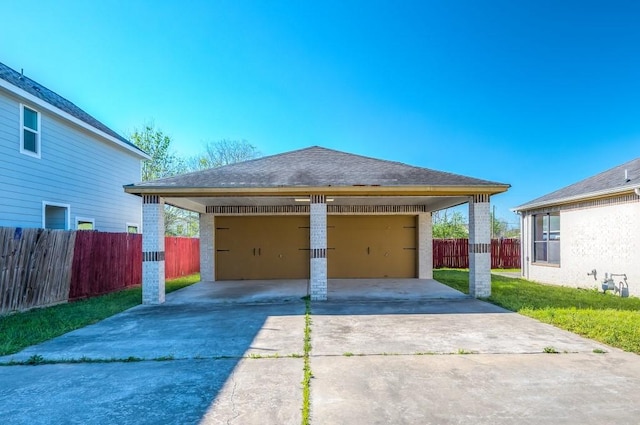 detached garage with fence