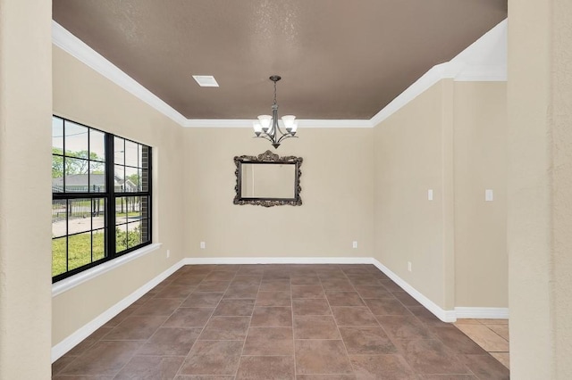 spare room featuring baseboards, ornamental molding, an inviting chandelier, and tile patterned floors