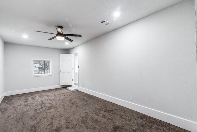 2821 1st Ave N, Texas City, TX 77590 - unfurnished room featuring baseboards, ceiling fan, visible vents, and dark colored carpet