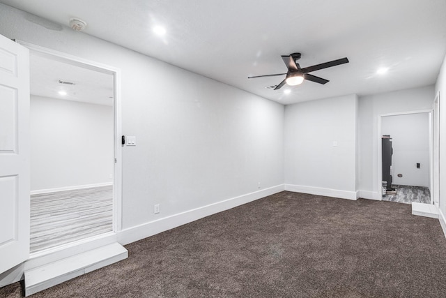 2821 1st Ave N, Texas City, TX 77590 - empty room with baseboards, recessed lighting, a ceiling fan, and dark colored carpet