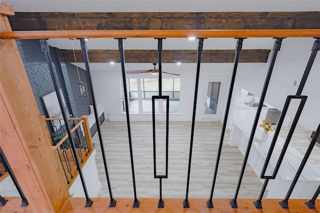 2902 Misty Park Dr, Houston, TX 77082 - detailed view of a ceiling fan, wood finished floors, and baseboards