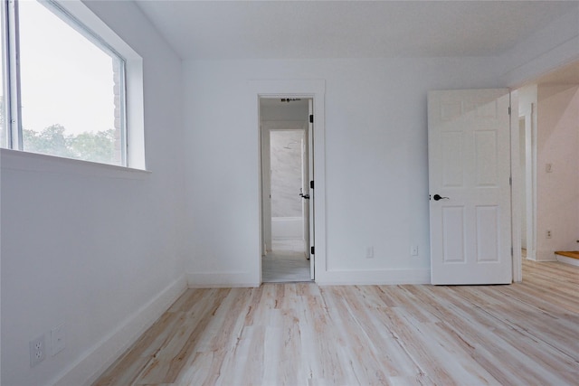 2902 Misty Park Dr, Houston, TX 77082 - unfurnished room featuring light wood-style floors and baseboards
