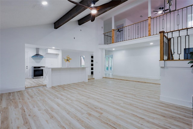 2902 Misty Park Dr, Houston, TX 77082 - unfurnished living room featuring a ceiling fan, high vaulted ceiling, beamed ceiling, wood finished floors, and baseboards