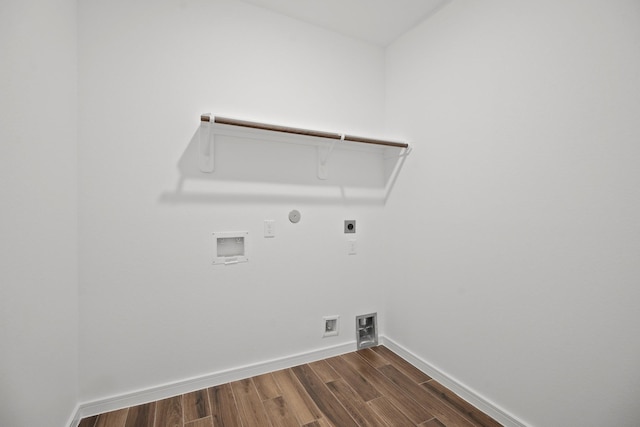 6215 Amberwood Dr, League City, TX 77573 - washroom featuring hookup for an electric dryer, dark wood-style flooring, washer hookup, and hookup for a gas dryer