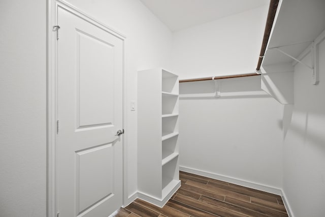 6215 Amberwood Dr, League City, TX 77573 - spacious closet with dark wood-style flooring