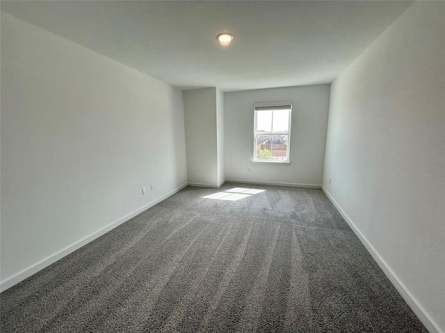 6215 Amberwood Dr, League City, TX 77573 - carpeted empty room featuring baseboards