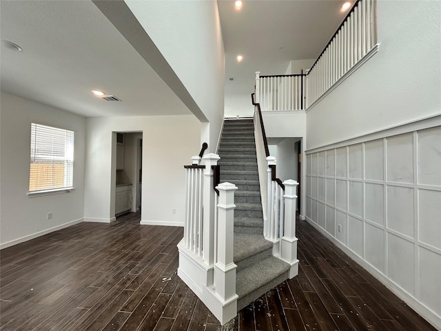 6215 Amberwood Dr, League City, TX 77573 - stairs featuring wood finished floors