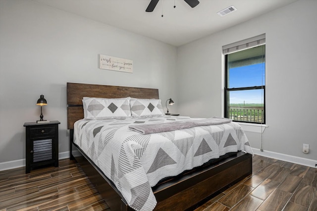1391 Mabry St, Gilchrist, TX 77617 - bedroom with baseboards, wood tiled floor, ceiling fan, and visible vents