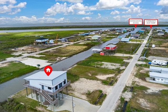 1391 Mabry St, Gilchrist, TX 77617 - birds eye view of property featuring a water view