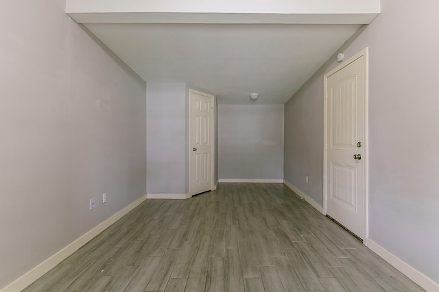 5009 Bataan Rd, Houston, TX 77033 - spare room featuring light wood-style flooring and baseboards