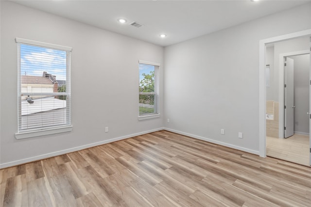 602 Thornton Rd Unit D, Houston, TX 77018 - empty room with light wood-type flooring, baseboards, and recessed lighting