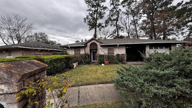 9627 Glenwood Forest Dr, Houston, TX 77078 - ranch-style home featuring an attached garage, brick siding, and a front yard