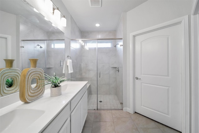 29026 Zacate Creek Ln, Fulshear, TX 77441 - full bathroom featuring tile patterned flooring, a stall shower, and double vanity