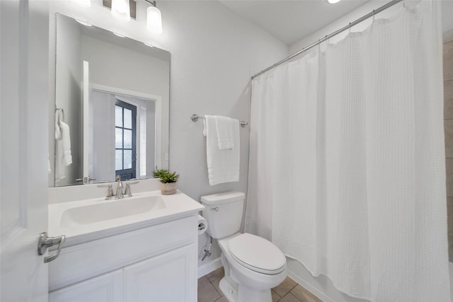 29026 Zacate Creek Ln, Fulshear, TX 77441 - full bathroom with toilet, tile patterned flooring, vanity, and shower / bathtub combination with curtain