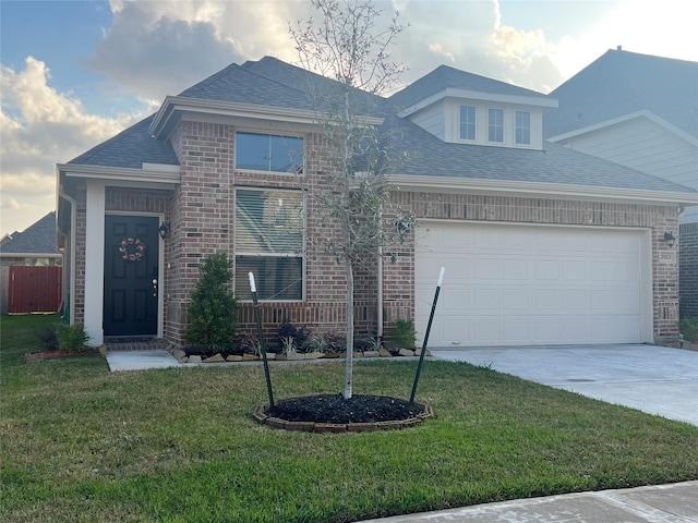 2923 Painted Sunrise Trl, Houston, TX 77045 - traditional-style house with a shingled roof, a front lawn, and concrete driveway