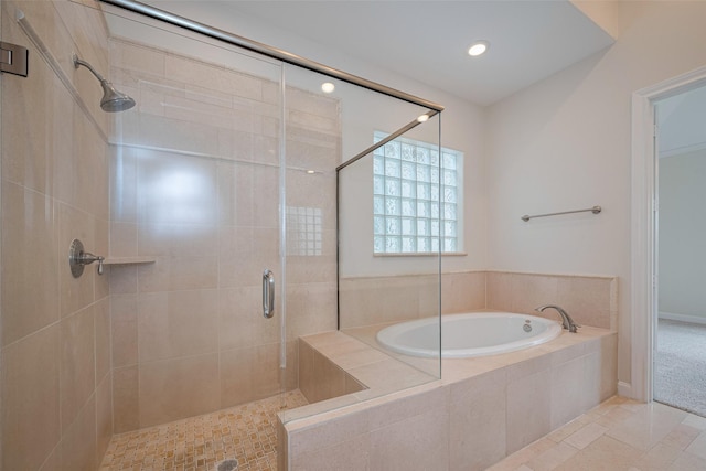 bathroom featuring recessed lighting, tile patterned floors, a shower stall, and a garden tub