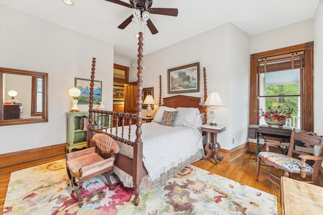 1101 Heights Blvd, Houston, TX 77008 - bedroom featuring wood finished floors, baseboards, and ceiling fan