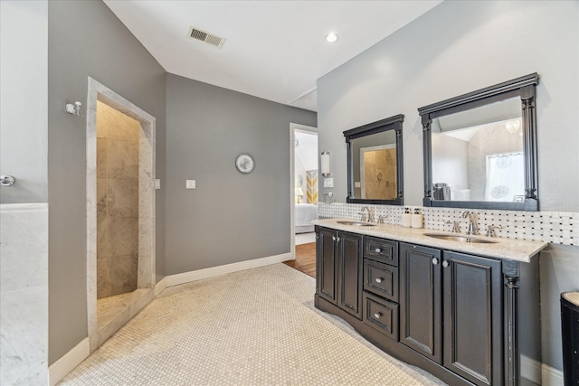 1101 Heights Blvd, Houston, TX 77008 - ensuite bathroom with double vanity and tasteful backsplash