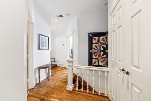 1101 Heights Blvd, Houston, TX 77008 - corridor featuring wood finished floors, an upstairs landing, and recessed lighting