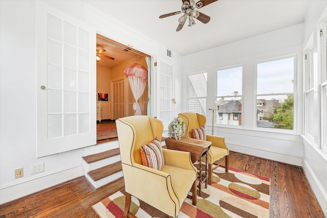 1101 Heights Blvd, Houston, TX 77008 - sitting room featuring ceiling fan, wood finished floors, and baseboards