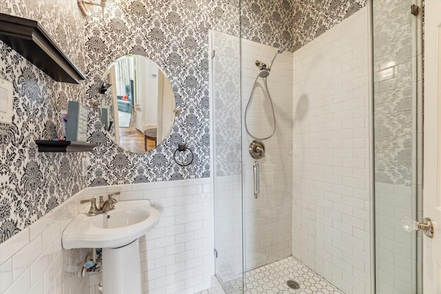 1101 Heights Blvd, Houston, TX 77008 - full bath featuring wallpapered walls, a stall shower, wainscoting, and tile walls