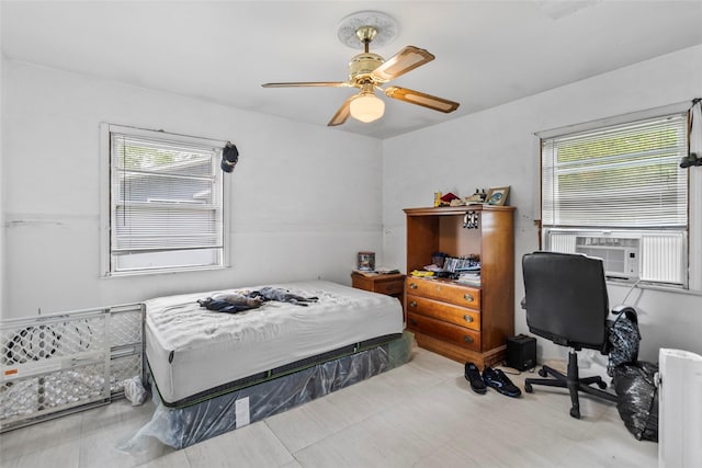 7135 Click Dr, Beaumont, TX 77708 - bedroom featuring multiple windows, cooling unit, a desk, and a ceiling fan