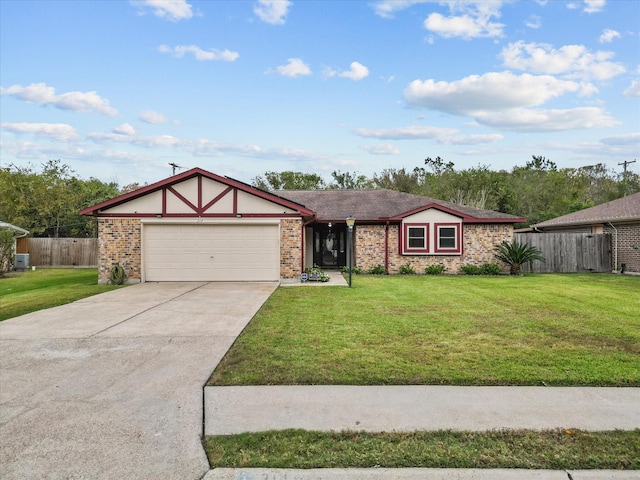 314 Lantana Dr, Texas City, TX 77591 - view of front of house with a front lawn, fence, a garage, and concrete driveway