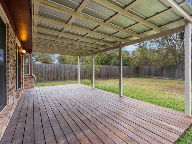 314 Lantana Dr, Texas City, TX 77591 - wooden deck featuring a fenced backyard and a lawn