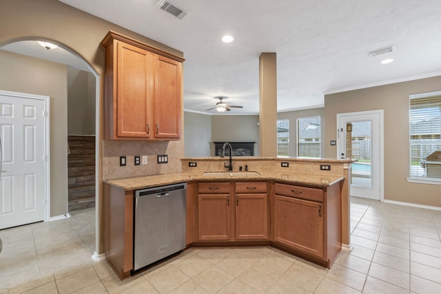 kitchen with visible vents, a sink, dishwasher, and light tile patterned flooring