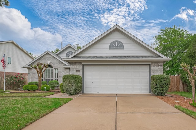 21122 Royal Villa Dr, Katy, TX 77449 - view of front of home featuring driveway, brick siding, and a garage