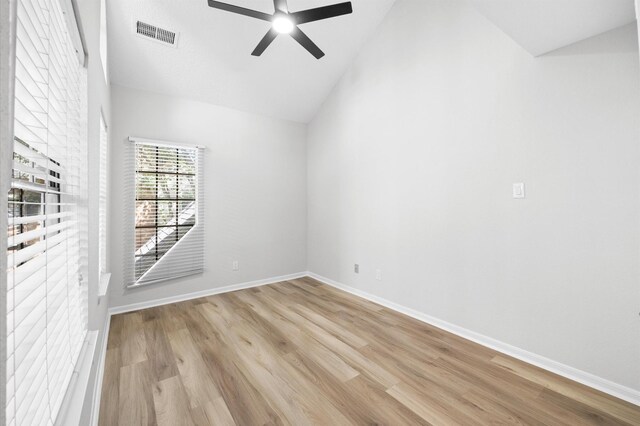 16800 Sugar Pine Dr Unit F51, Houston, TX 77090 - spare room featuring visible vents, baseboards, ceiling fan, light wood finished floors, and vaulted ceiling