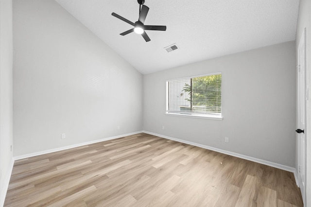 16800 Sugar Pine Dr Unit F51, Houston, TX 77090 - empty room featuring visible vents, baseboards, ceiling fan, light wood finished floors, and lofted ceiling