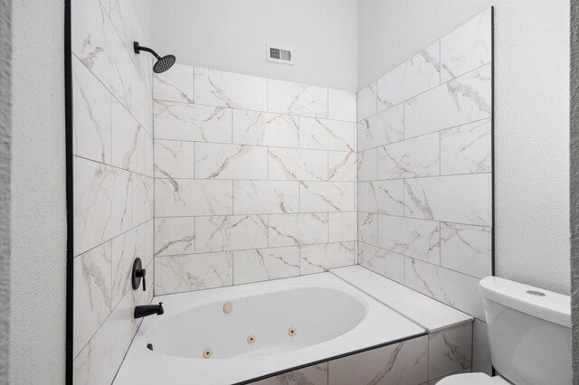 16800 Sugar Pine Dr Unit F51, Houston, TX 77090 - bathroom with a combined bath / shower with jetted tub, visible vents, and toilet