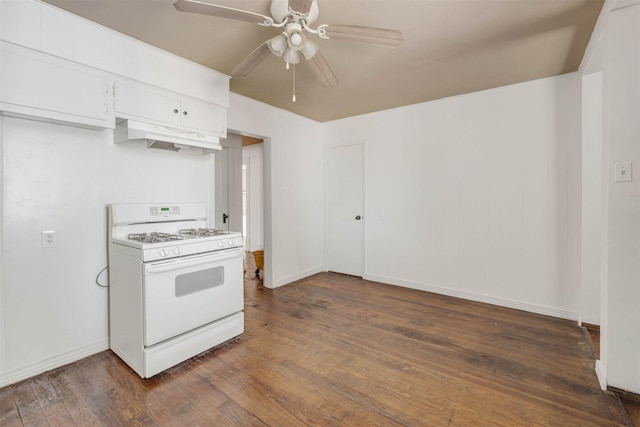 kitchen featuring gas range gas stove, dark wood finished floors, under cabinet range hood, white cabinetry, and ceiling fan