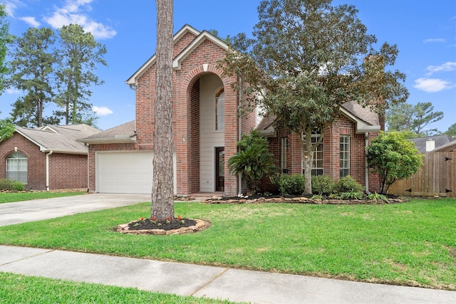 traditional home featuring concrete driveway, an attached garage, brick siding, and fence