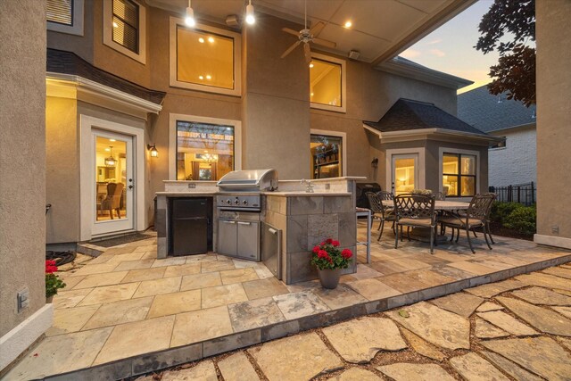 271 W Pines Dr, Montgomery, TX 77356 - view of patio / terrace with outdoor dining space, a sink, and a ceiling fan