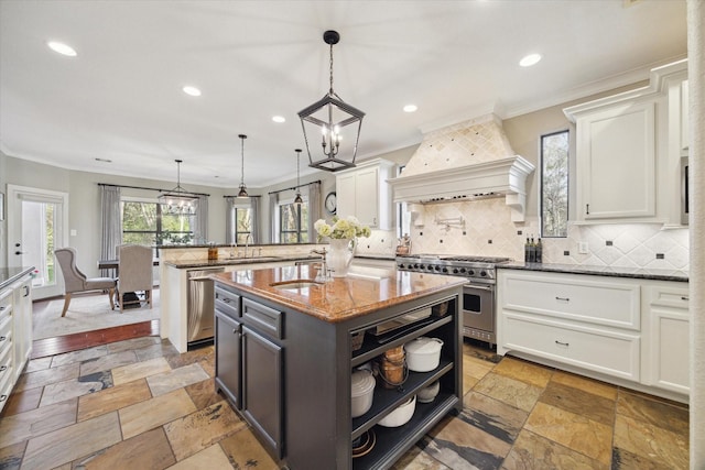 271 W Pines Dr, Montgomery, TX 77356 - kitchen featuring stainless steel appliances, custom exhaust hood, crown molding, open shelves, and recessed lighting