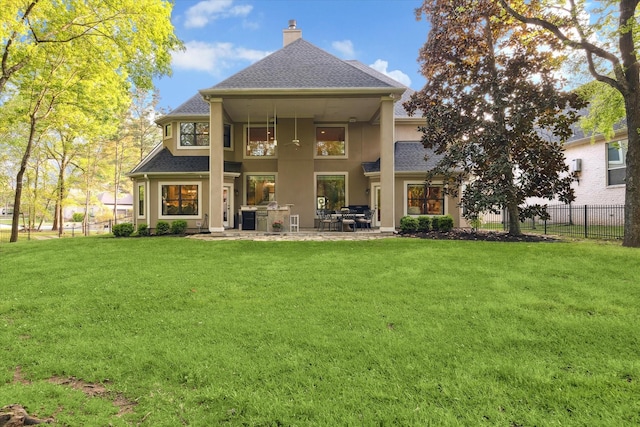 271 W Pines Dr, Montgomery, TX 77356 - back of property featuring stucco siding, a shingled roof, a chimney, and a patio area