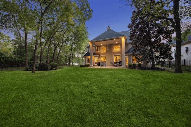 271 W Pines Dr, Montgomery, TX 77356 - rear view of house with a chimney and stucco siding